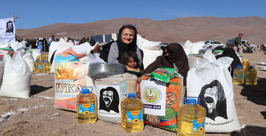 Food distribution for affected families of recent earthquake in Herat province.